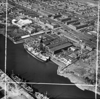 Barclay, Curle and Co, Ltd, north British Diesel Engine Works,  Whiteinch, Govan, Lanarkshire, Scotland, 1950. Oblique aerial photograph taken facing north.  This image has been produced from a crop marked negative.