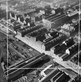 Glasgow, general view, showing Arbuckle, Smith and Co, Bonded Warehouse, Stanley Street and Kinning Park Goods Station,   Pollokshields, Govan, Lanarkshire, Scotland, 1950. Oblique aerial photograph taken facing north.  This image has been produced from a crop marked negative.