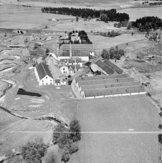 Distillery at Tomatin, Craig Morile, Moy and Dalarossie, Inverness-shire, Scotland, 1950. Oblique aerial photograph taken facing north-east.