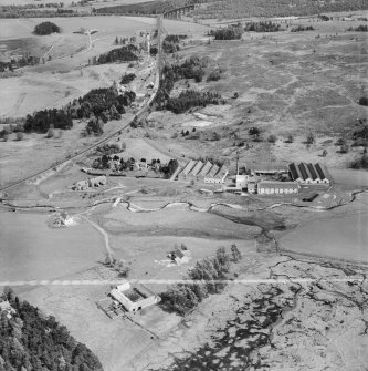 Distillery at Tomatin, Craig Morile, Moy and Dalarossie, Inverness-shire, Scotland, 1950. Oblique aerial photograph taken facing south-east.