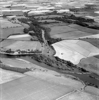 Junction of River Till and River Tweed, Tweedmill, Coldstream, Berwickshire, Scotland, 1950. Oblique aerial photograph facing south-east.