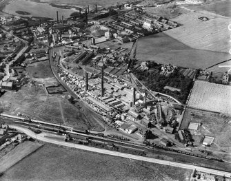 Glenboig Union Fireclay Co. Star Fireclay Works and Union Fireclay Works,  Old Monkland, Lanarkshire, Scotland, 1930. Oblique aerial photograph  taken facing west. This image has been produced from a marked negative.