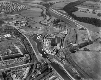 Robinson Dunn and Co. Ltd. Temple Saw Mills and Forth and Clyde Canal, New Kilpatrick, Dunbartonshire, Scotland, 1930.  Oblique aerial photograph taken facing north-west.