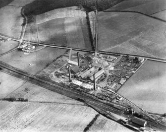 Glenboig Union Fireclay Co. Cumbernauld Fireclay Works, Cumbernauld, Dunbartonshire, Scotland, 1930.  Oblique aerial photograph taken facing west.