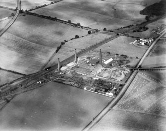 Glenboig Union Fireclay Co. Cumbernauld Fireclay Works, Cumbernauld, Dunbartonshire, Scotland, 1930.  Oblique aerial photograph taken facing east.