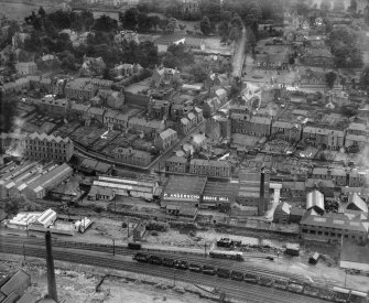 General view, showing Peter Anderson Ltd. Bridge Mill, Huddersfield Street and Gala Water, Galashiels, Selkirkshire, Scotland, 1939.  Oblique aerial photograph taken facing south. 