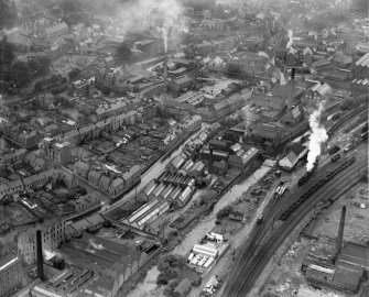 General view, showing Peter Anderson Ltd. Bridge Mill, Huddersfield Street and Gala Water, Galashiels, Selkirkshire, Scotland, 1939.  Oblique aerial photograph taken facing west. 