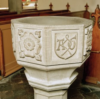 Font from Kinkell Old Parish Church now in St John's Episcopal Church, Aberdeen.
Detail of panels displaying a) a rose, and b) a shield charged with the linked initials A G, for Alexander Galloway.