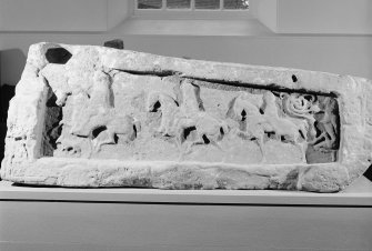 View of side detail of Meigle no.11 grave slab in display in Meigle Museum.