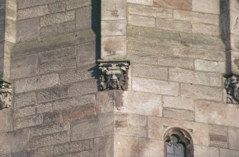View of carved green man on church tower, Crail Parish Church.
