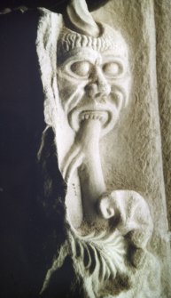 Detail of carved headstone showing Green Man, St Andrews Cathedral Museum.