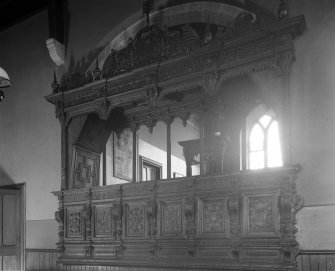 Old Pitsligo Church. Carved pew from old church now in new one.