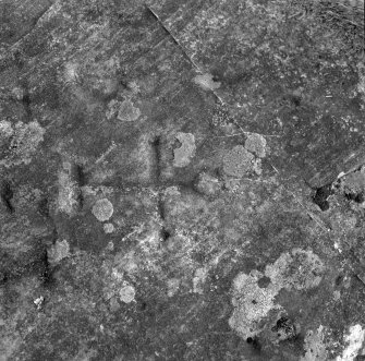 View of cross incised on St Molaise's Table.