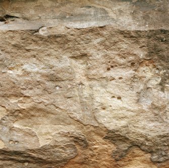 Exterior view of St Molaise's Cave, Holy Island, showing carved cross.