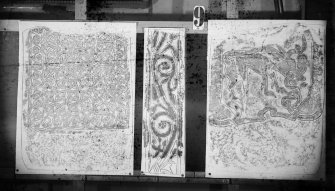 Photographic copy of three rubbings. The outer rubbings shows the front and back of Fortevion no.1 cross slab. The middle rubbing depicts the right side of a cross fragment from St Mary's Chapel, Aberlady.
