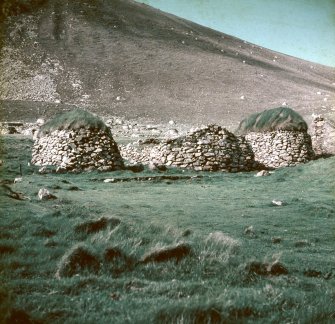 A general view of a St Kilda blackhouse (R) flanked by two cleitean (78 and 79).