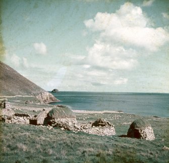 A general view of a St Kilda blackhouse (R) flanked by two cleitean (78 and 79).