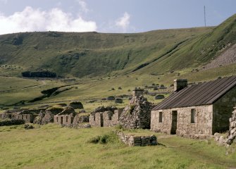 St Kilda Village. General view to the west with the gable of Blackhouse E in the foreground.