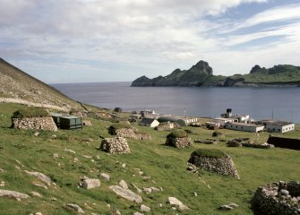 St Kilda, Village Bay. General view of cleitean, military base and Dun, facing south east, with the old head dyke in the foreground.