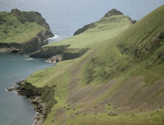 St Kilda. View of the enclosures at the site of St Brianan's Church, with Ruival and Dun in the background.