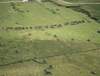 St Kilda, Village Bay. General view of the area of the crofts behind Houses 12-16 showing cultivation remains, cleitean, turf-cutting etc.