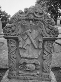 Detail of headstone to Henry Kedslie showing flesher and tools,Tranent Parish Church Burial Ground.