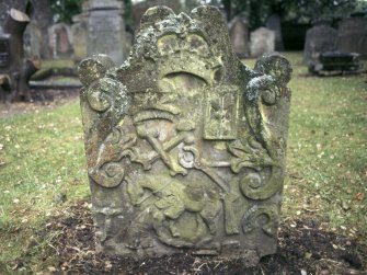 View of headstone to John Tennant d. 1728 with horse and blacksmith tools, Alloway Auld Kirk Churchyard.