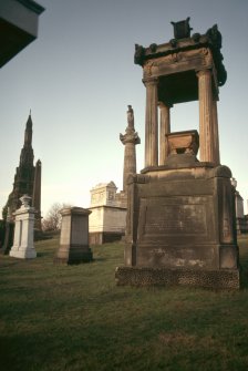 General view of Glasgow Necropolis with large pedestal  monument in foreground.