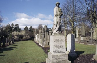General view with memorial statue to James Young d. 1908, New Kilpatrick Parish Church Burial Ground, Bearsden.