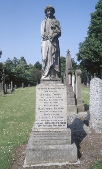 View of  memorial statue to James Young d.1909 and Margaret Rankin d.1930, New Kilpatrick Parish Church Burial Ground, Bearsden.