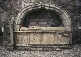 View of tomb with effigy and carvings, St Mary's Churchyard, Rothesay.