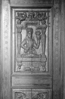 Detail of carved wooden panels.
Insc: 'Charitie'.