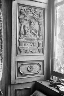 Detail of carved wooden panel.
Insc: 'S.Luke'