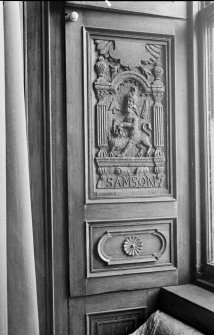 Detail of carved wooden panel.
Insc: 'Samson'