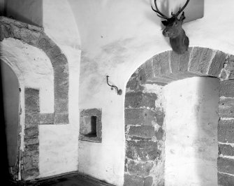 Delgatie Castle. Interior. View of hall inside front door.