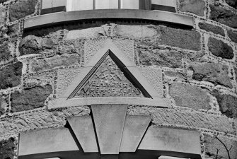 Aberdeenshire, Glenkindie House. Detail of pediment reset in modern block.