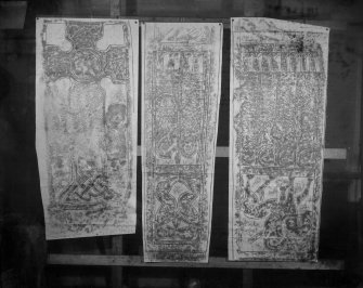 Photographic copy of three rubbings. The left rubbing shows the face of Menmuir no.1 cross slab. The middle and right rubbings show the Dupplin Cross.