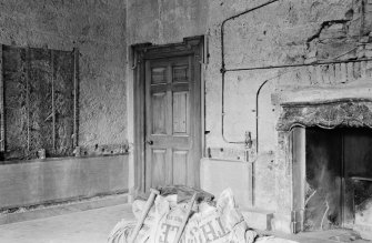 Interior view of entrance hall in Gilmerton House after fire showing signs of earlier work.