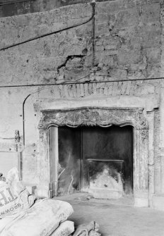 Interior view of entrance hall in Gilmerton House after fire showing earlier work.