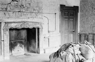 Interior view of entrance hall in Gilmerton House after fire showing earlier work.