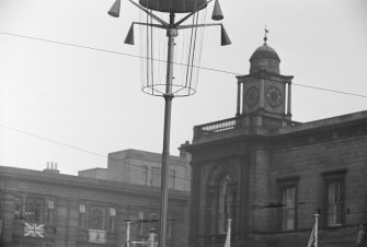 View of decorations on Princes Street, Edinburgh for the Coronation of Queen Elizabeth II showing part of General Register House.