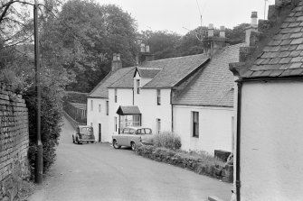 General view of 26-34 Kirk Road, Carmunnock, Glasgow from north east.