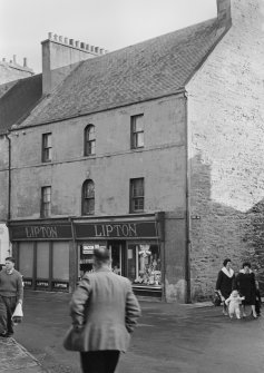View of 1-3 High Street, Thurso, from west, showing Lipton's shop.