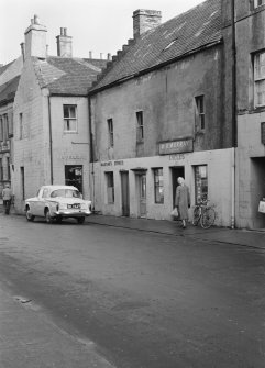 View of 11-17 High Street, Thurso, from west showing W D Murray bicycle shop, MacKay's Stores and R Fidler shop.