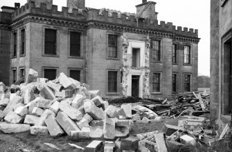 View of East face of West block of Gordon Castle during demolition work