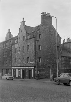 General view of 104 St Leonard's Street, Edinburgh, including Castle o' Clouts, from S, and the entrance to Usher Brewery.