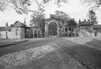 General view from south of the Lion Gate and West lodge, Ladykirk House