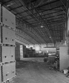 View from NW of brickworks main storage shed, previously an aircraft hangar, re-erected at the site after World War Two (similar to Lime Store at neighbouring lime works)