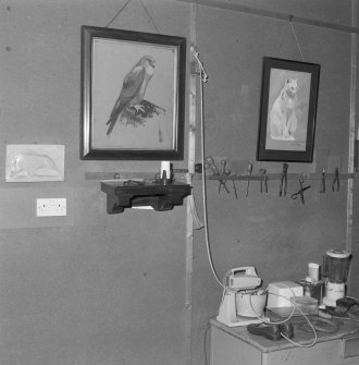 First floor, studio, wall, paintings and tools, detail