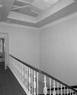 First floor, view of skylight and banister over old staircase